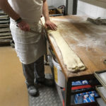 Prepping Kamerun for oven at Bakery Roth in Erfurt