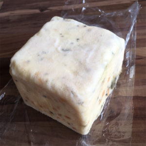 Wrapped end of a Caerphilly bandage-wrapped cheese