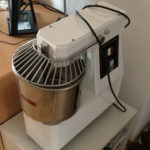 A personal-sized kneading machine for use in the home