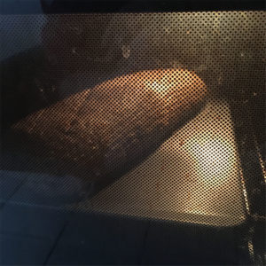 Freitagsbrot baking in the oven at 200°C for 45 minutes